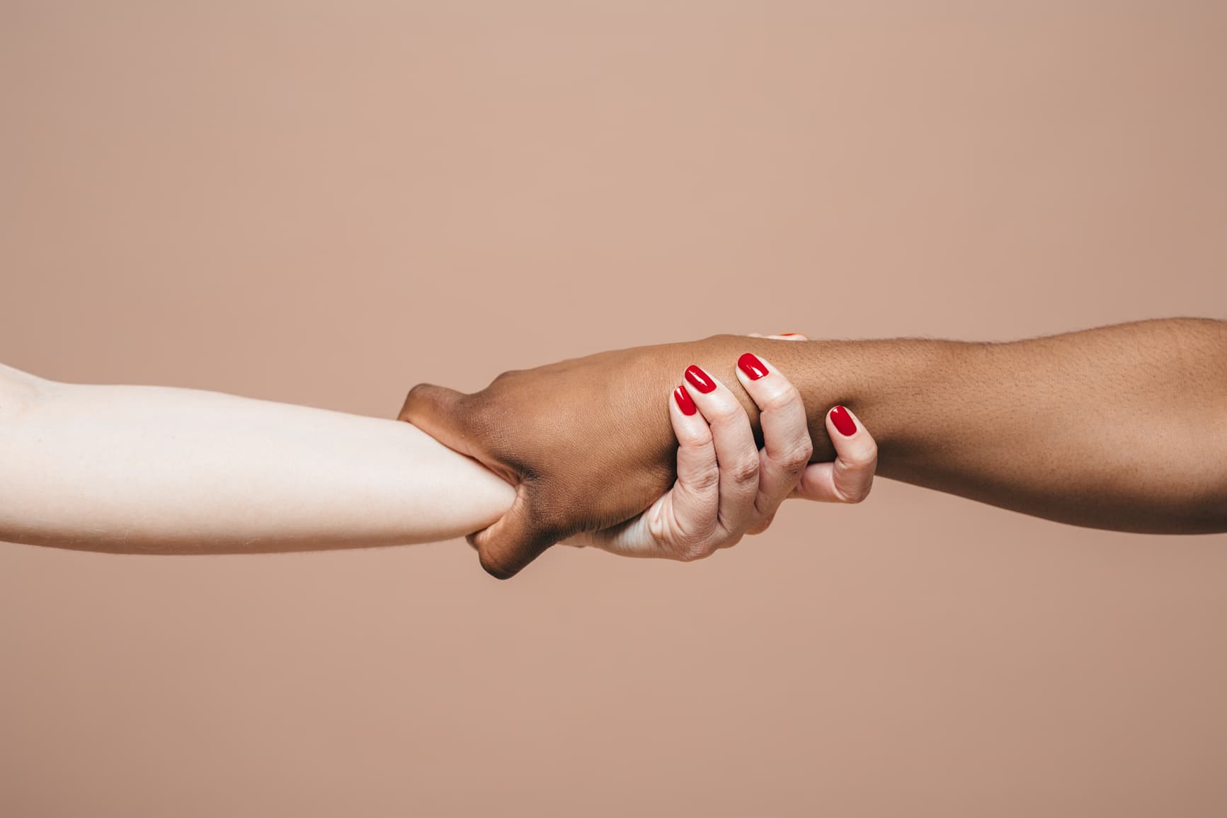 Two people clasping hands